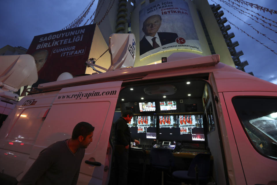 A satellite truck with an editing station provides coverage of the local elections in Ankara, Turkey, Sunday, March 31, 2019. Millions of Turks have voted in municipal elections that President Recep Tayyip Erdogan depicted as a fight for Turkey's survival, and which are a crucial test of the strongman's own support amid a sharp economic downturn. The voting, which ended in the evening, has been marred by scattered election violence that killed at least two people and injured dozens of others across Turkey. (AP Photo/Ali Unal)