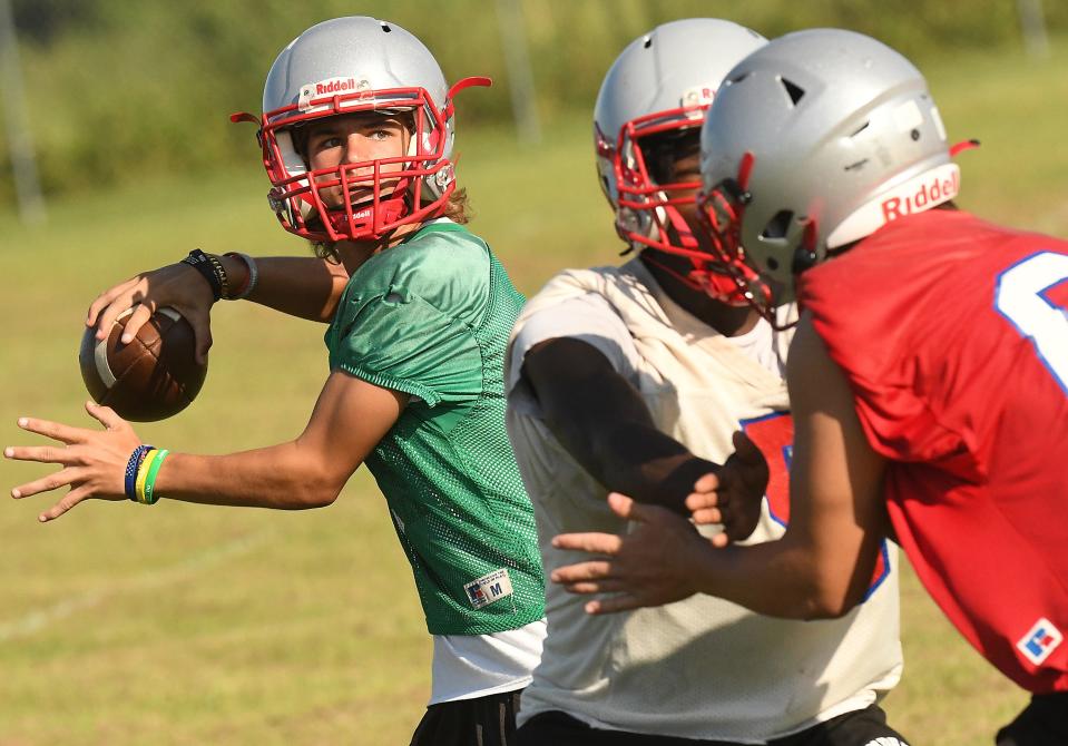 Pender runs through plays Tuesday Aug. 1, 2023 in Burgaw, N.C. High School football kicked off this week with coaches and players hitting the practice fields across the area. (KEN BLEVINS/STARNEWS)