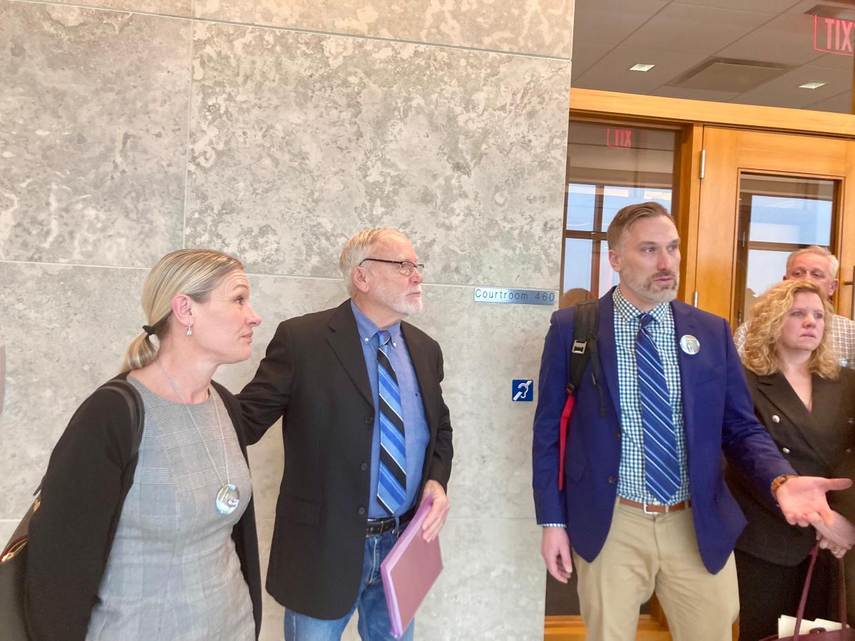 Angie Hibbs (L), Charlie Hibbs (C), David Hibbs (R) Lori Kennedy (FR) outside the Doylestown courtroom after the sentencing of Robert Atkins to life without parole in the 1991 murder of Joy Hibbs.