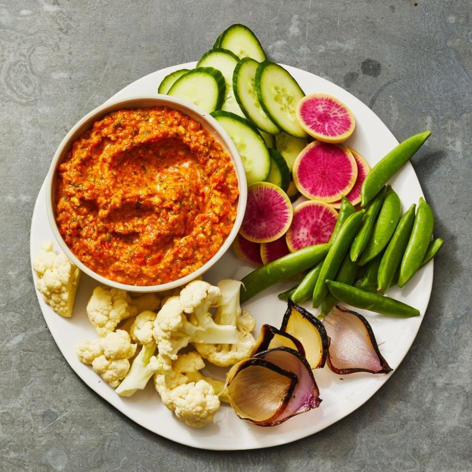 <p>This chunky dip features roasted almonds for a rich, nutty flavor that's delicious with veggies.</p><p>Get the <strong><a href="https://www.goodhousekeeping.com/food-recipes/a39876818/roasted-red-pepper-dip-recipe/" rel="nofollow noopener" target="_blank" data-ylk="slk:Roasted Red Pepper Dip recipe;elm:context_link;itc:0;sec:content-canvas" class="link ">Roasted Red Pepper Dip recipe</a></strong>.</p>