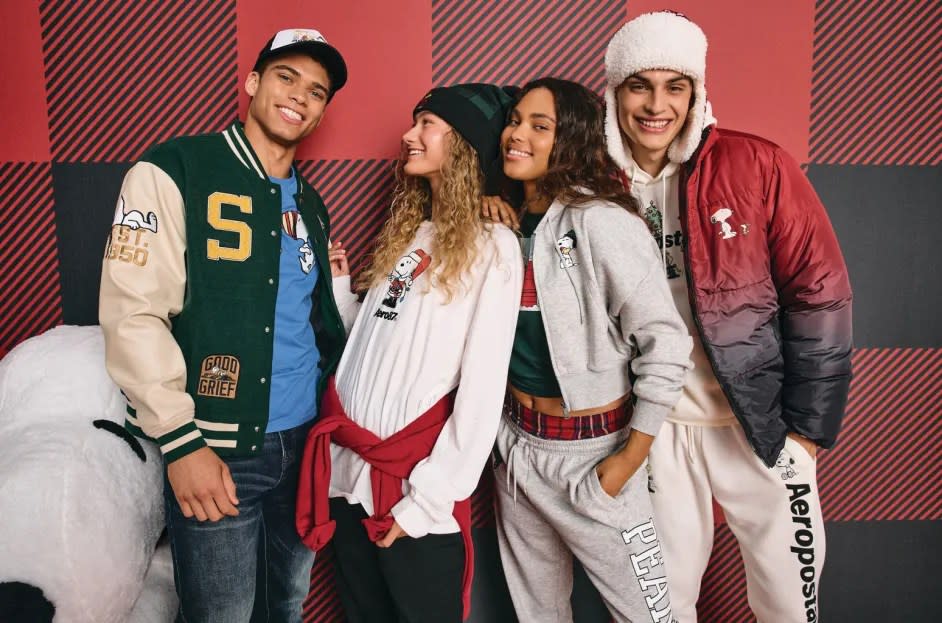 Young people wear Snoopy and Peanuts merchandise in an Aeropostale ad. 