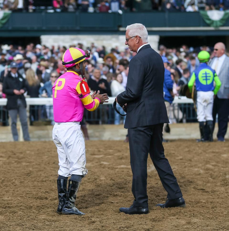 Trainer Todd Pletcher talks with jockey Luis Saez after Tapit Trice claimed the 2023 Toyota Blue Grass Stakes April 8 at Keeneland. April 8, 2023