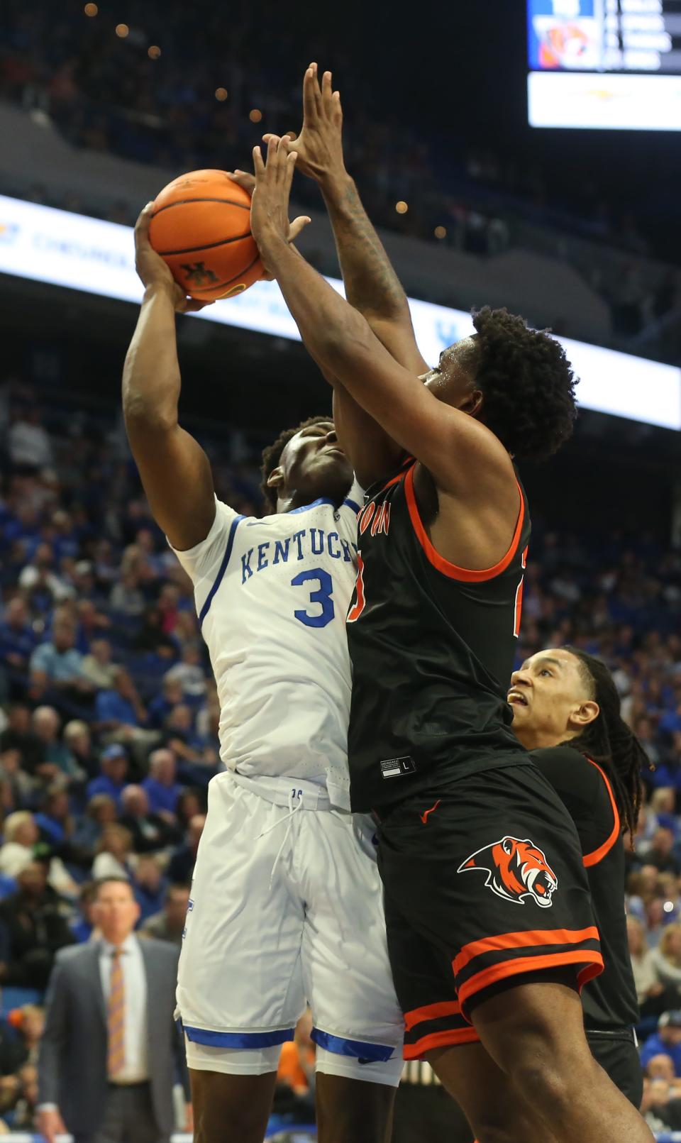 Kentucky’s Adou Thiero tries to make a shot against Georgetown College’s Kyran Jones on Friday night.