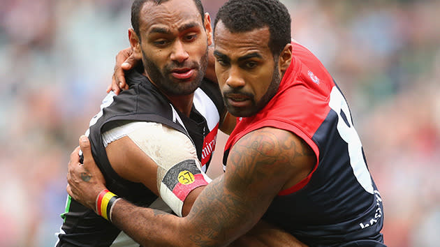 Travis Varcoe and Heritier Lumumba pay tribute to Adam Goodes.