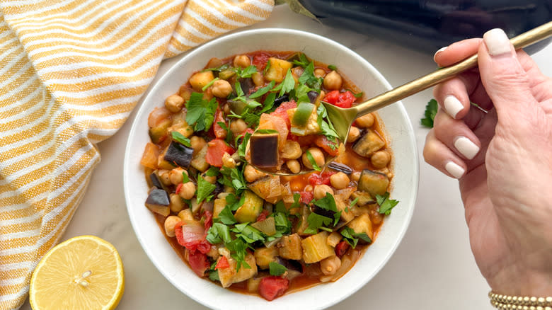 eggplant chickpea tomato stew in white bowl