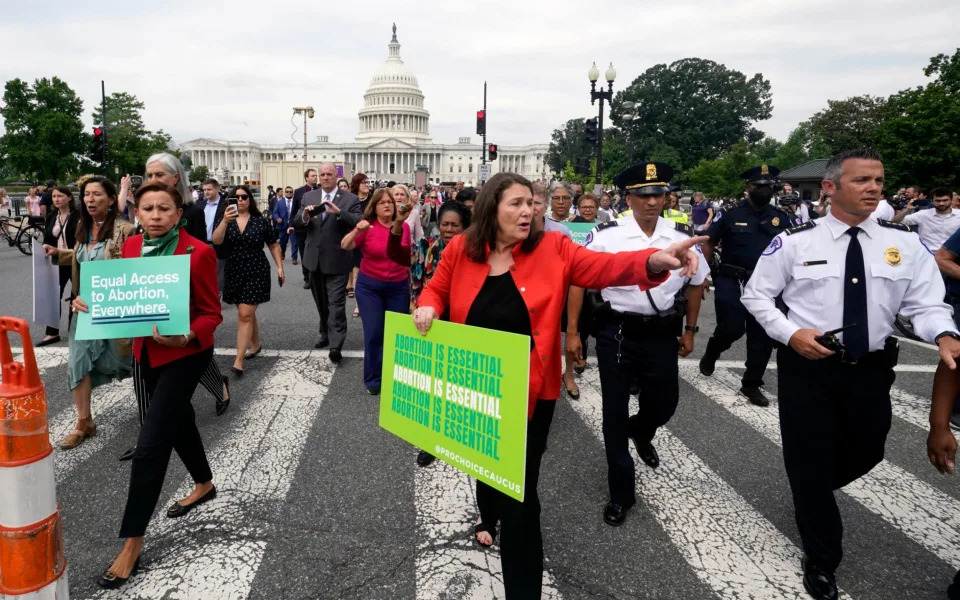 Members of the House of Representatives walk from the Capitol to the Supreme Court to protest the abortion decision - AP Photo/Steve Helber