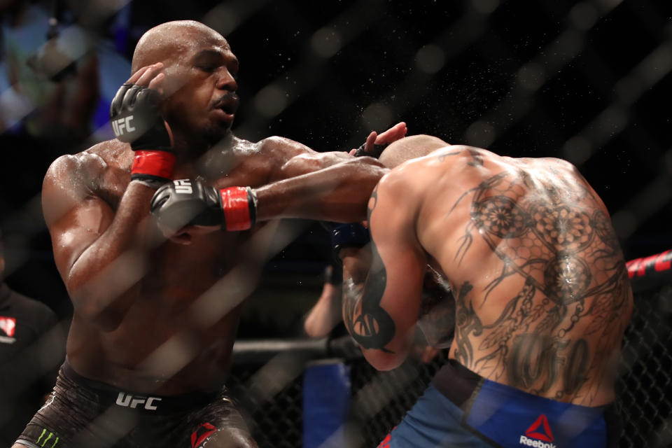 Jon Jones elbows Anthony Smith in their UFC light heavyweight championship bout during UFC 235 at T-Mobile Arena on March 2, 2019 in Las Vegas. (Zuffa LLC)