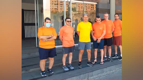 PHOTO: CITGO oil executives Jose Angel Pereira, from left to right, Gustavo Cardenas, Jorge Toledo, Jose Luis Zambrano, Tomeu Vadell and Alirio Jose Zambrano, are pictured outside the Bolivarian National Intelligence Service, in Caracas, Venezuela.  (AP, FILE)