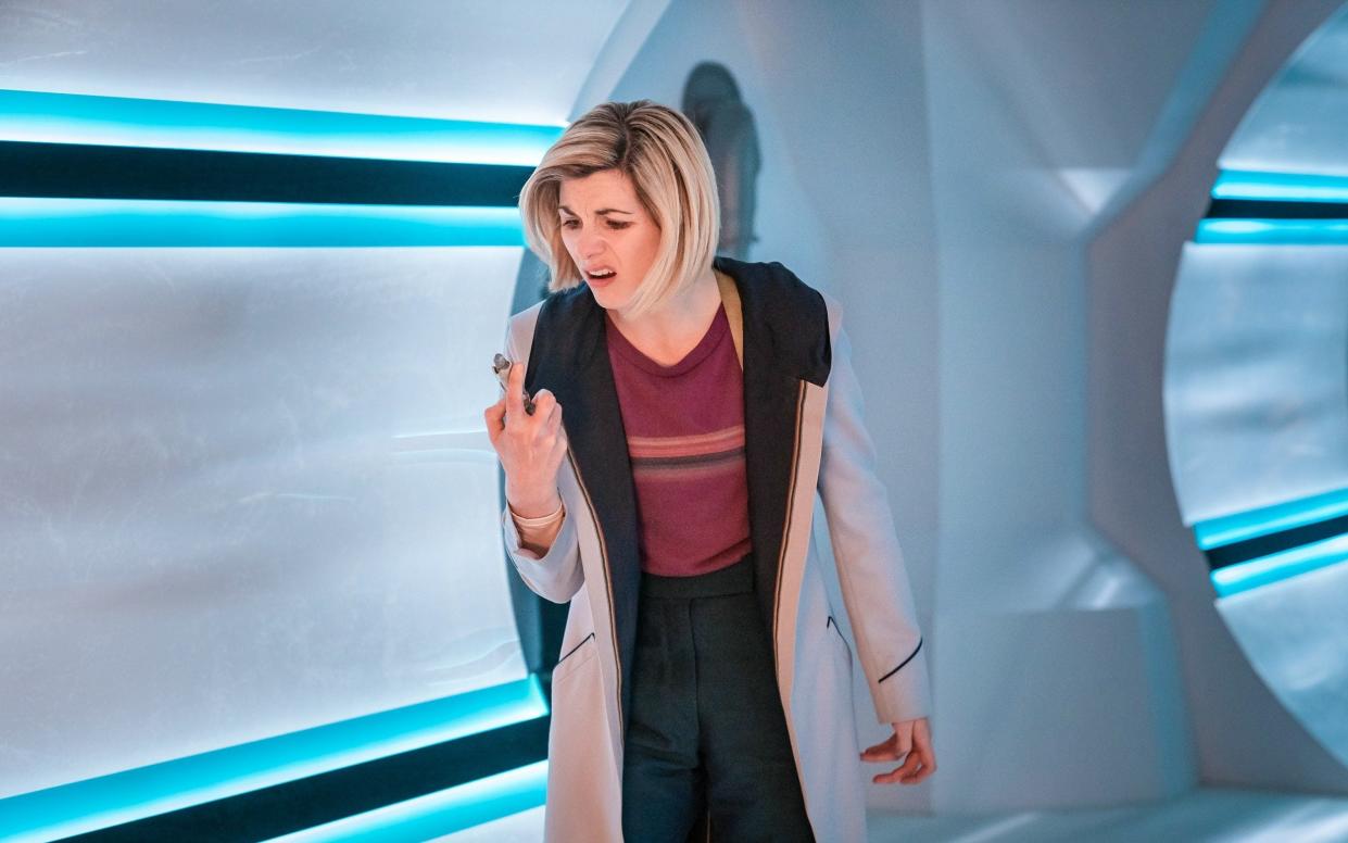 Jodie Whittaker as the Doctor, examining her belched-up sonic screwdriver - 5