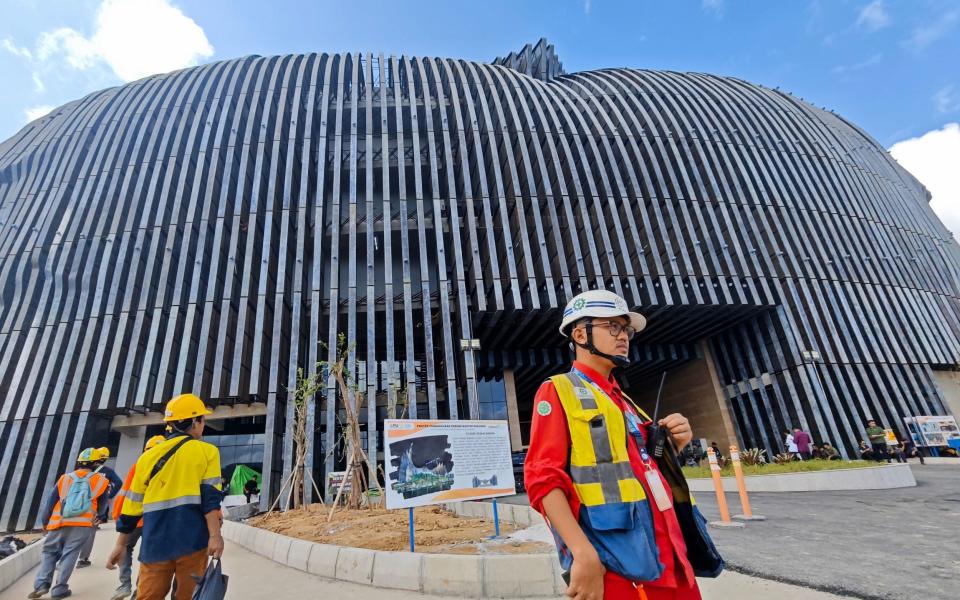 Construction workers at a site in Indonesia's future capital city of Nusantara