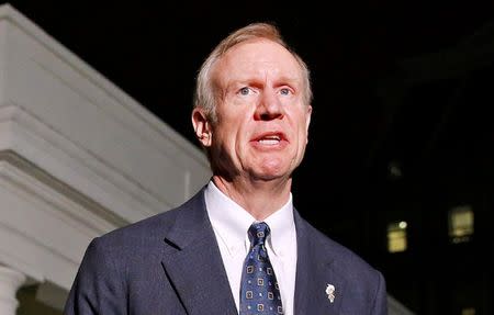 FILE PHOTO: Illinois Gov-elect Bruce Rauner speaks to the media after a meeting with U.S. President Barack Obama and other Governor-elects from seven U.S. states at the White House in Washington December 5, 2014. REUTERS/Larry Downing/File Photo