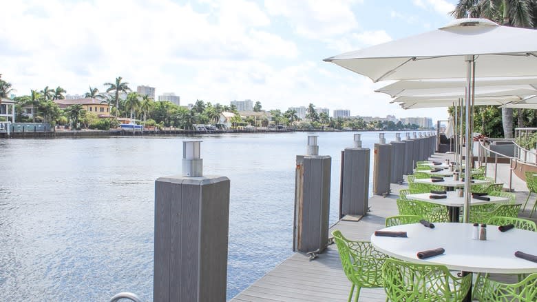 Riverside tables with green chairs