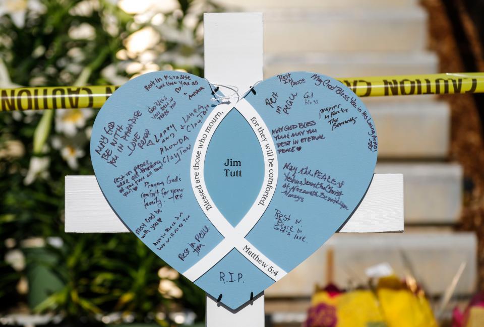 Five crosses with hearts for victims of the Old National Bank mass shooting -- Josh Barrick, Tommy Elliott, Jim Tutt Jr., Juliana Farmer, Deana Eckert -- at the steps of the Old National Bank on Wednesday morning. The five bank employees were killed during mass shooting two days earlier on April 10. Nine others were injured, including a Louisville Metro Police officer in downtown Louisville, Ky.  April 12, 2023