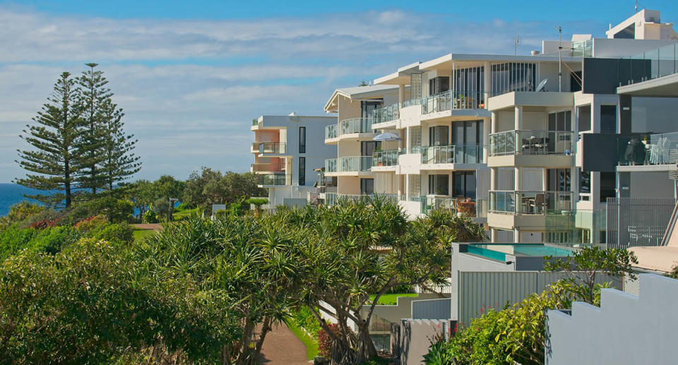 A row of apartments overlooking the ocean on the Sunshine Coast.