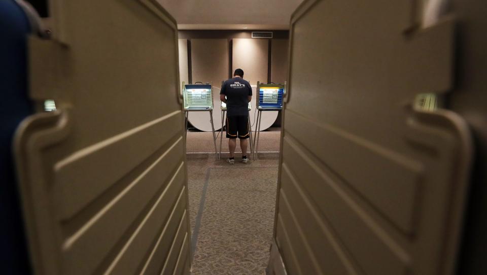 A Cuyahoga Falls resident fills out his special election ballot at Community Vineyard Church, Tuesday, Aug. 8, 2023, in Cuyahoga Falls, Ohio.