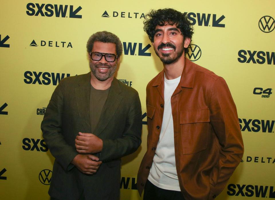 Jordan Peele, left, and Dev Patel, arrive for the world premiere of 