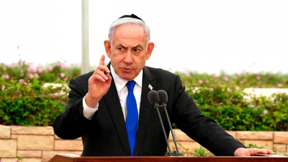 PHOTO: Israeli Prime Minister Benjamin Netanyahu speaks during a ceremony at the Nahalat Yitshak Cemetery in Tel Aviv, Israel, on June 18, 2024.  (Shaul Golan, POOL via AP)