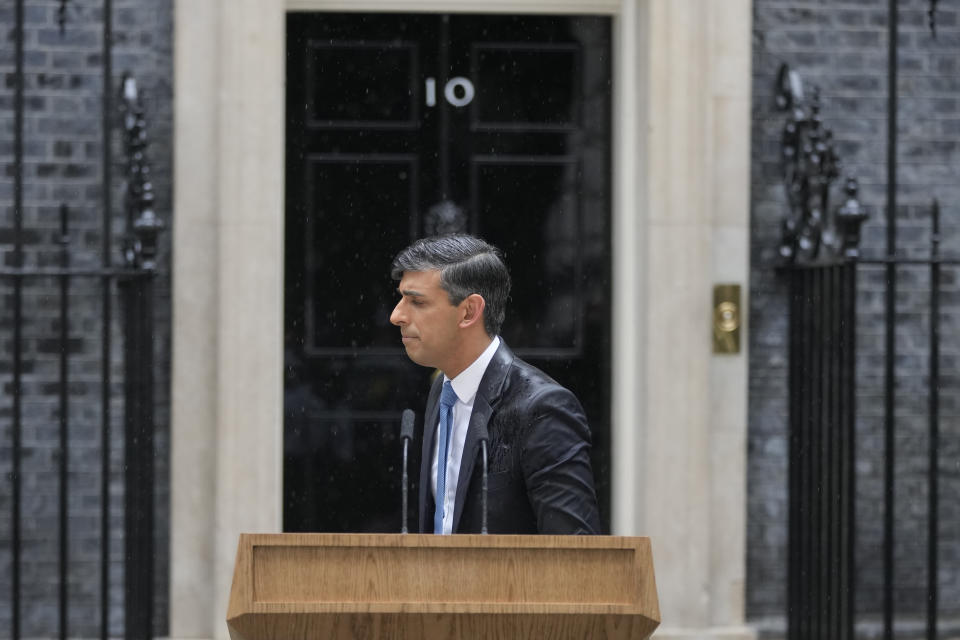 Britain's Prime Minister Rishi Sunak turns away after speaking to the media outside 10 Downing Street in London Wednesday, May 22, 2024, as he announced that he is to call a General Election for July 4. (AP Photo/Kin Cheung)