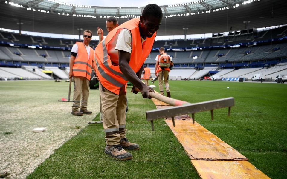 The new pitch was installed within 48 hours - AFP VIA GETTY IMAGES