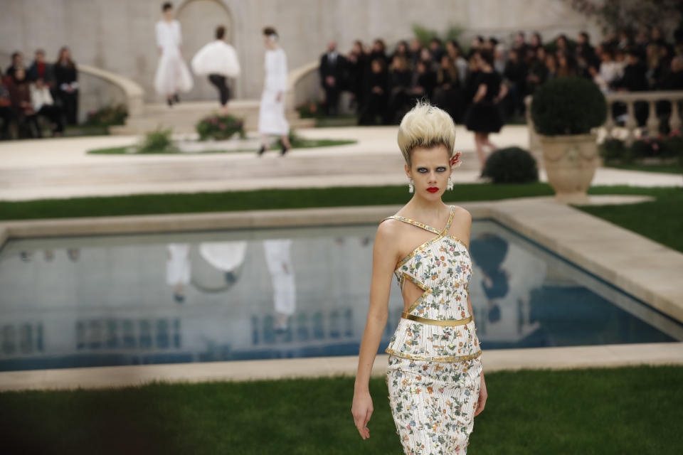 A model wears a creation for the Chanel Spring/Summer 2019 Haute Couture fashion collection presented in Paris, Tuesday Jan. 22, 2019. (AP Photo/Christophe Ena)