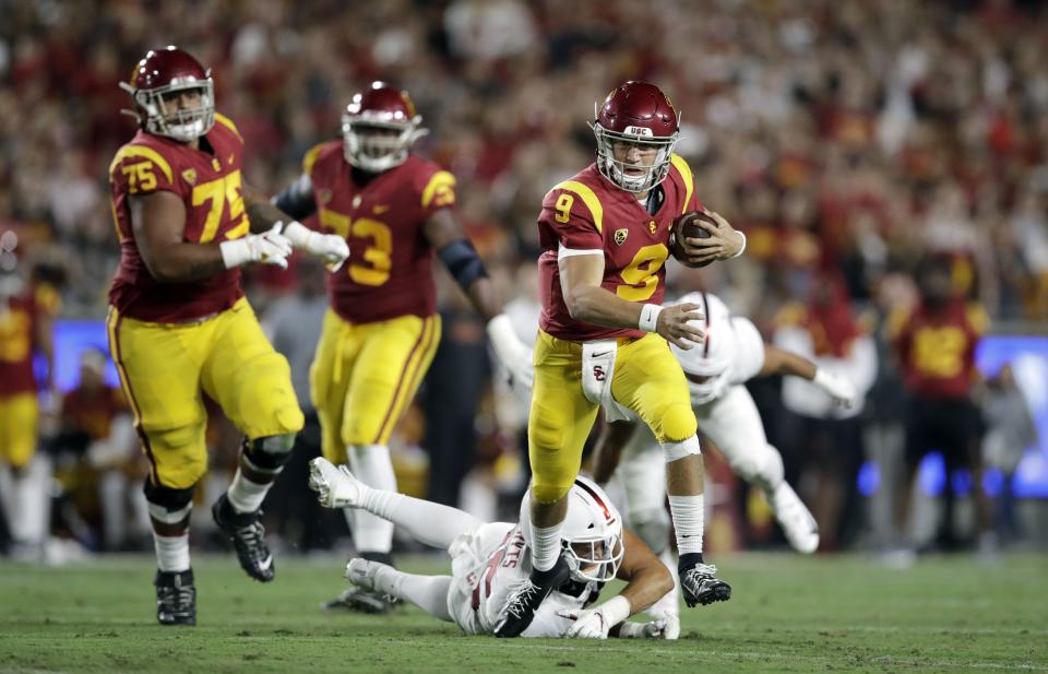 USC quarterback Kedon Slovis runs against Stanford during game Saturday, Sept. 7, 2019, in Los Angeles. In his first collegiate start, Slovis guided the Trojans past the Cardinal. | Marcio Jose Sanchez, Associated Press