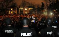 University of Kentucky fans and students take to the streets after the University of Connecticut defeated Kentucky in the NCAA Men's National Basketball Championship near the university campus in Lexington, Kentucky, April 7, 2014. REUTERS/John Sommers II (UNITED STATES - Tags: CIVIL UNREST SPORT BASKETBALL)