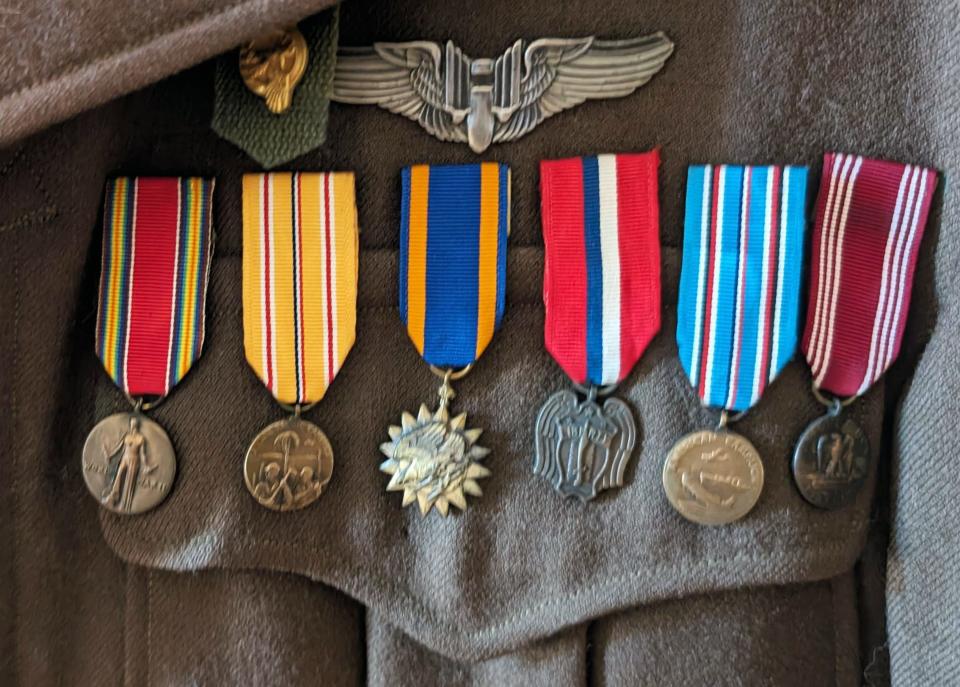 A row of medals on Quentin Stambaugh's original wool military jacket.