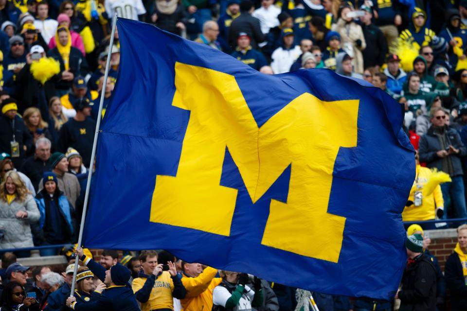 October 17, 2015; Ann Arbor, Michigan, USA; Flag bearers of the Michigan Wolverines marching band before the game against the Michigan State Spartans at Michigan Stadium. Mandatory Photo Credit: Rick Osentoski-USA TODAY Sports