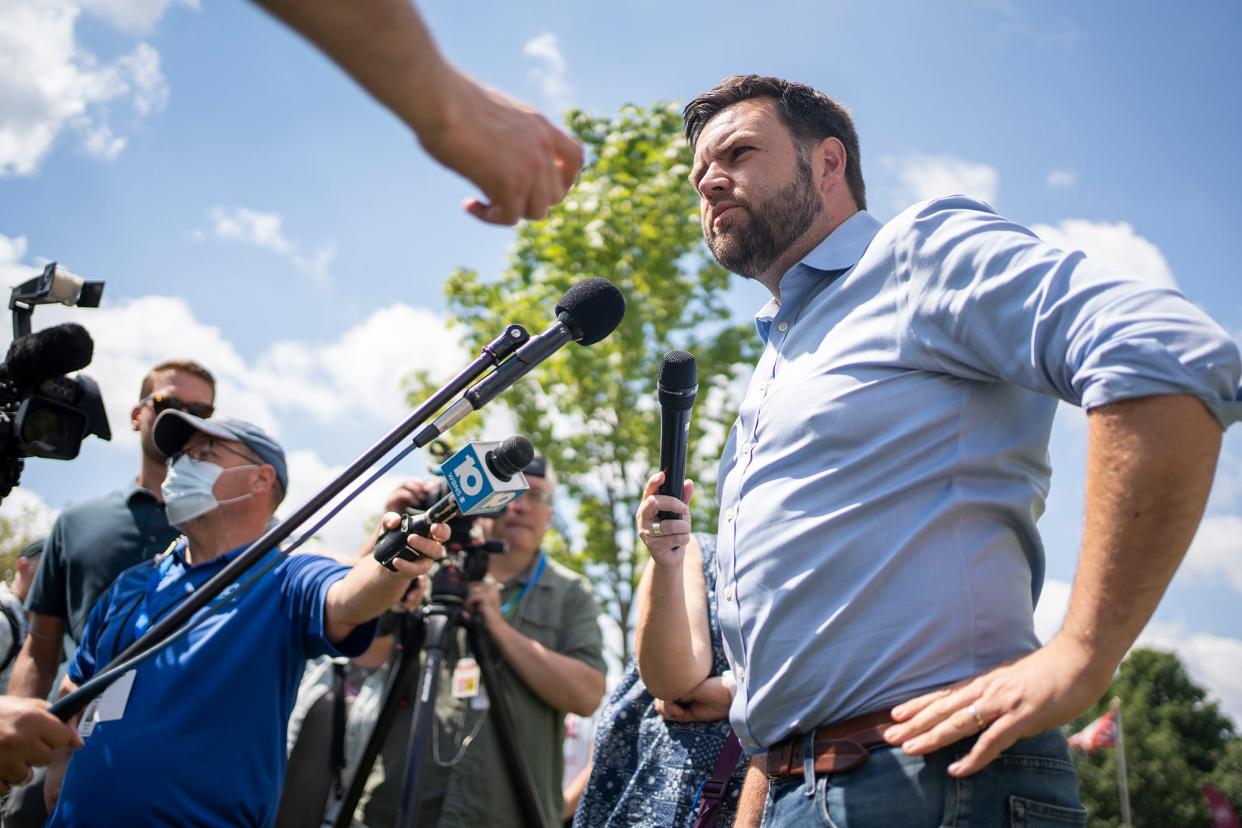 Ohio Senate candidate J.D. Vance talks to reporters at the Ohio State Fair on Tuesday.