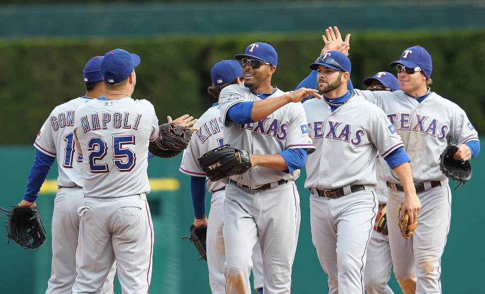 DETROIT, MI - APRIL 22: Mitch Moreland #18 of the Texas Rangers celebrates with his teammates after defeating the Detroit Tigers 3-2 at Comerica Park on April 22, 2012 in Detroit, Michigan (Photo by Leon Halip/Getty Images)