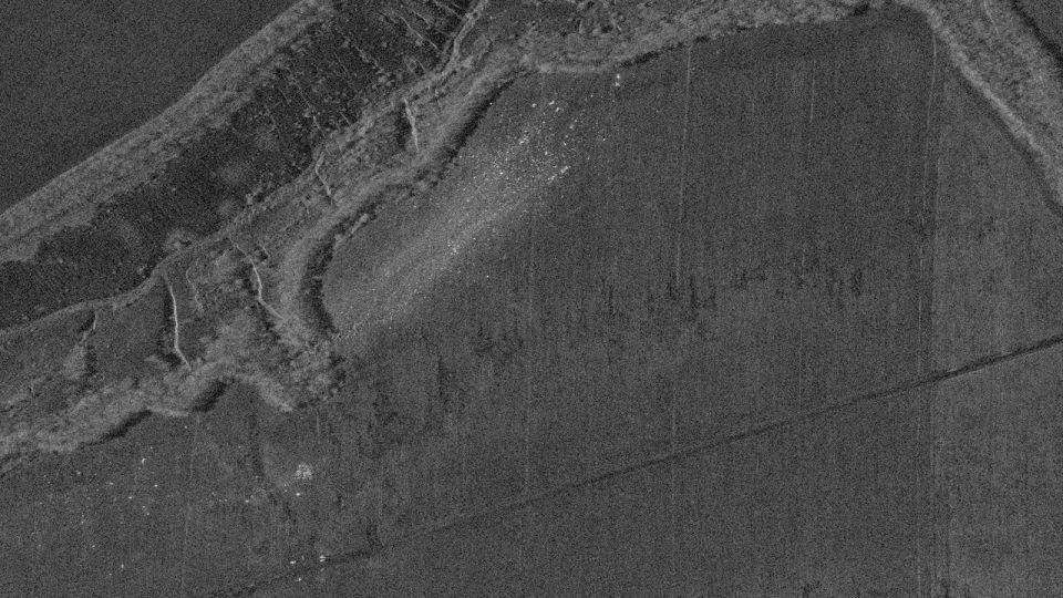 SAR or synthetic aperture radar imagery, provided by Umbra Lab, shows the roughly mile long crash site of the Il-76 plane crash site in a field in rural Belgorod oblast. - Umbra Lab