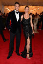  <p class="MsoNormal">NFL star Tom Brady brought a hot date – his wife Gisele Bundchen. The supermodel rocked some serious cleavage in this sequined Givenchy number she paired with strappy black heels. Oh, and in case you were wondering, Tom is wearing a Tom Ford tux. </p>