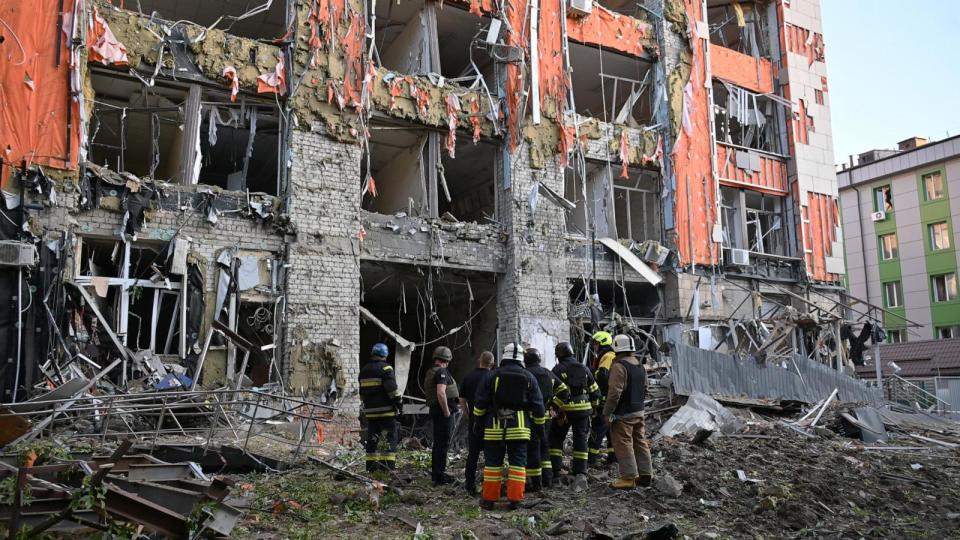 PHOTO: Firefighters inspect a heavily damaged office building following Russian air strike in Kharkiv, on May 25, 2024, amid the Russian invasion of Ukraine. (Sergey Bobok/AFP via Getty Images)