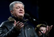 Ukraine's former President Petro Poroshenko takes part in a rally ahead of the so-called "Normandy" format summit, in Kiev