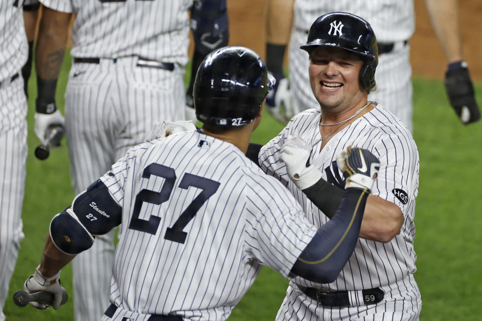 New York Yankees' Luke Voit celebrates hitting a three-run home run during the second inning of a baseball game against the Toronto Blue Jays on Tuesday, Sept. 15, 2020, in New York. (AP Photo/Adam Hunger)