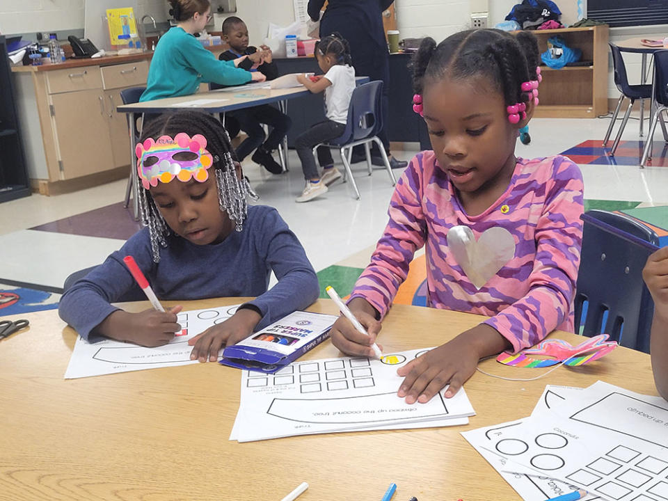 Students work on craft projects at the Mary Martin Elementary School afterschool program in Cleveland. (Patrick O’Donnell)