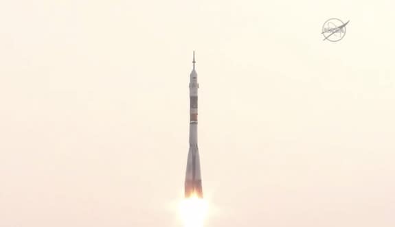 The Soyuz spacecraft carrying NASA astronaut Kate Rubins, cosmonaut Anatoly Ivanishin and Japanese spaceflyer Takuya Onishi toward the International Space Station rises into the skies above Kazakhstan on July