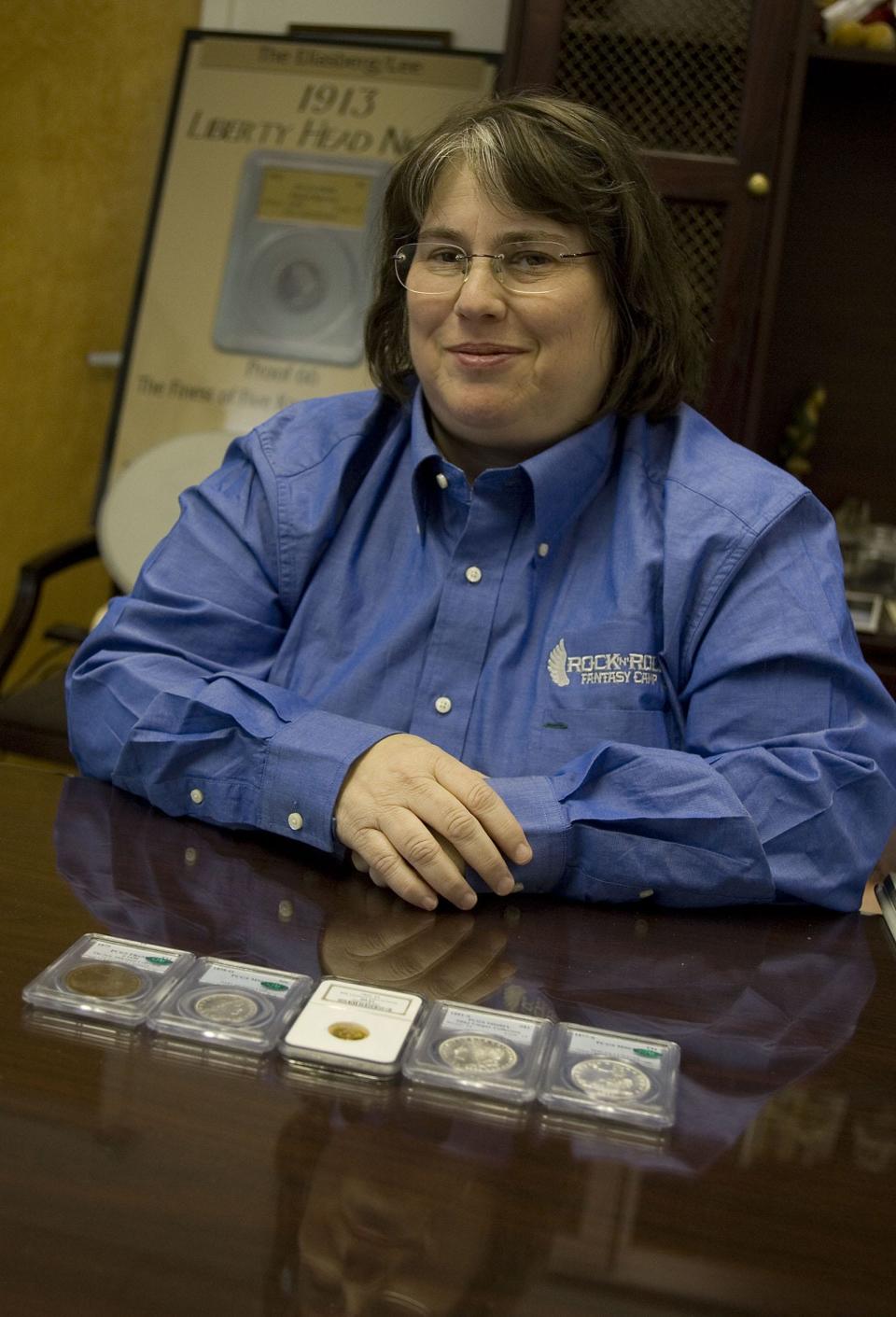 12-07-07  Legends Numismatics, Tinton Falls. Laura Sperber is a partner for a business that buys and sells very rare and expensive coins. Photo by Keith J. Woods/ Staff Photographer(# 38193)