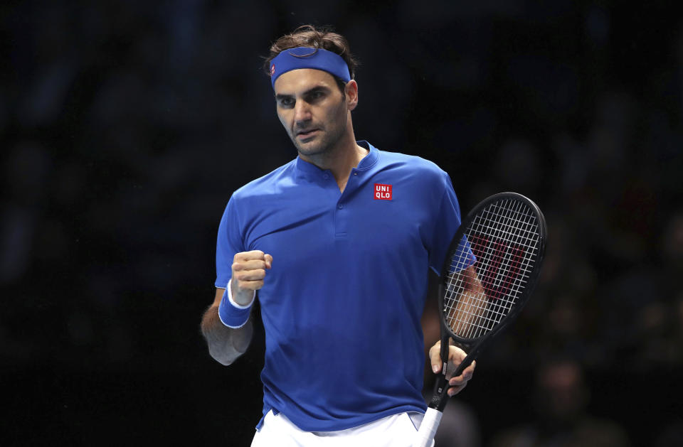 Switzerland's Roger Federer gestures during his ATP World Tour Finals men's singles tennis match against South Africa's Kevin Anderson at the O2 arena in London, Thursday, Nov. 15, 2018. (John Walton/PA via AP)