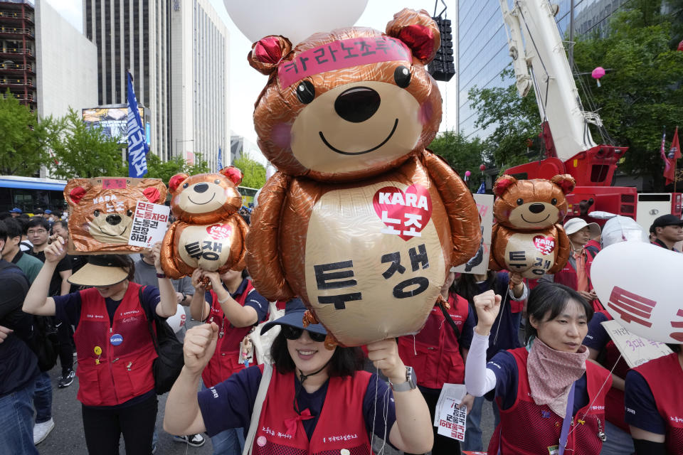Members of the Korean Confederation of Trade Unions shout slogans during a rally on May Day in Seoul, South Korea, Wednesday, May 1, 2024. (AP Photo/Ahn Young-joon)