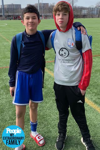 <p>courtesy of the VandeHei family</p> Kelvin, left, and James, right, playing soccer together prior to Kelvin's adoption