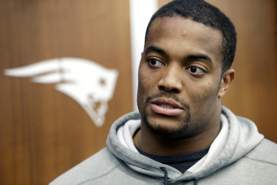 FILE - New England Patriots defensive end Trey Flowers speaks with reporters in the team's locker room following an NFL football practice, Wednesday, Jan. 16, 2019, in Foxborough, Mass. The Patriots announced Tuesday, Aug. 8, 2023, that they have signed DE Trey Flowers. Flowers spent his first four seasons with New England from 2015 through the 2018 season and was a part of two Super Bowl wins with the Patriots in 2016 and 2018. (AP Photo/Steven Senne, File)