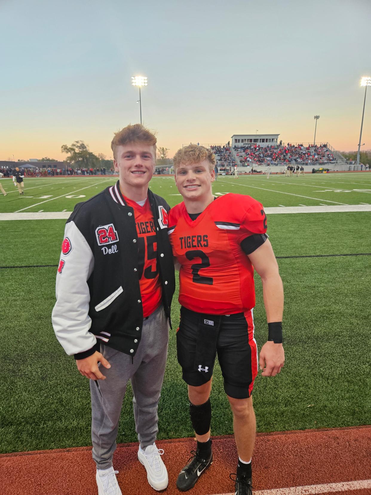 Brevin Doll, left, and Aiden Flora pose for a photo before an ADM football game in October 2023. Doll missed most of his senior season after breaking his arm in the third game of the year.