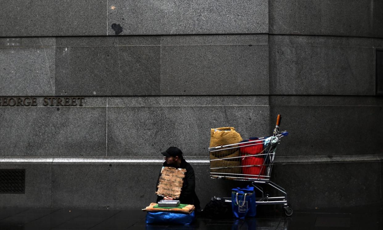 <span>Australia’s charities have been forced to reduce the amount they give to recipients, in a bid to help me more people. </span><span>Photograph: Saeed Khan/AFP/Getty Images</span>