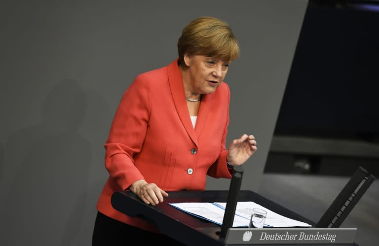 German Chancellor Angela Merkel addresses lawmakers in the Bundestag in Berlin on July 17, 2015