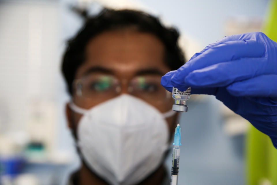 A healthcare worker prepares a dose of Pfizer, coronavirus (Covid-19) vaccine at a vaccination centre in London. (Photo by Dinendra Haria / SOPA Images/Sipa USA)