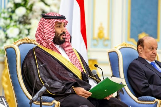 Saudi Crown Prince Mohammed bin Salman (L) is reported to be "Royal Family Member-1," who is mentioned in a US indictment over an alleged plot to use Twitter data to spy on dissidents