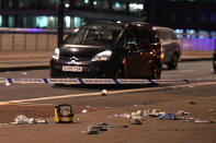 <p>Debris and abandoned cars remain on London at the scene of an apparent terror attack in central London on June 3, 2017.<br> Armed police fired shots after reports of stabbings and a van hitting pedestrians on London Bridge on Saturday in an incident reminiscent of a terror attack in March just days ahead of a general election. (Chris J Ratcliffe/AFP/Getty Images) </p>