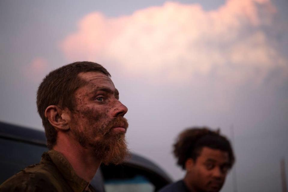 Oregon firefighter Kerry Boyd ends his shift as the Bootleg Fire expands to over 225,000 acres on July 15, 2021.