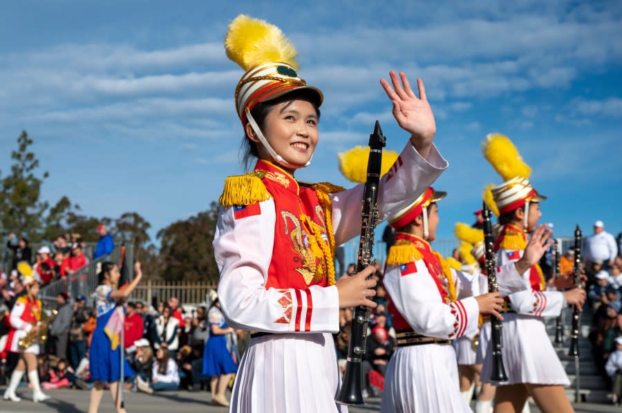 The Taipei First Girls High School Marching Band, Honor Guard and Color Guard perform at the 134th Rose Parade in Pasadena, Calif., Monday, Jan. 2, 2023. (AP Photo/Michael Owen Baker)